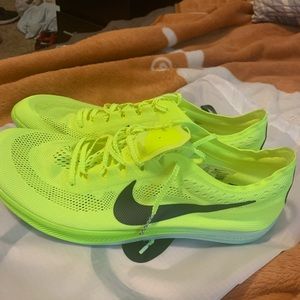 Nike dragonfly’s size 11, never worn, spikes and box including